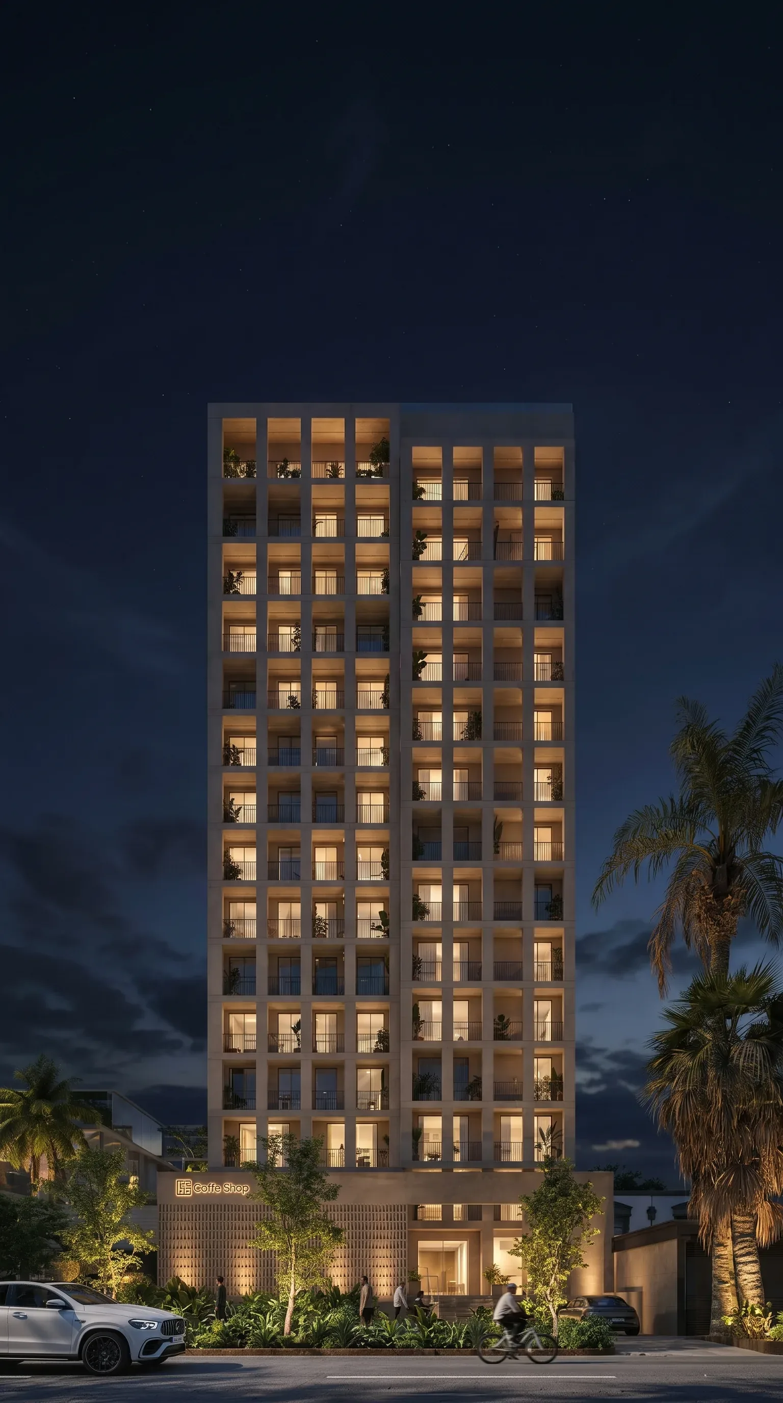 Torre HOF Lofts al atardecer con los interiores encendidos