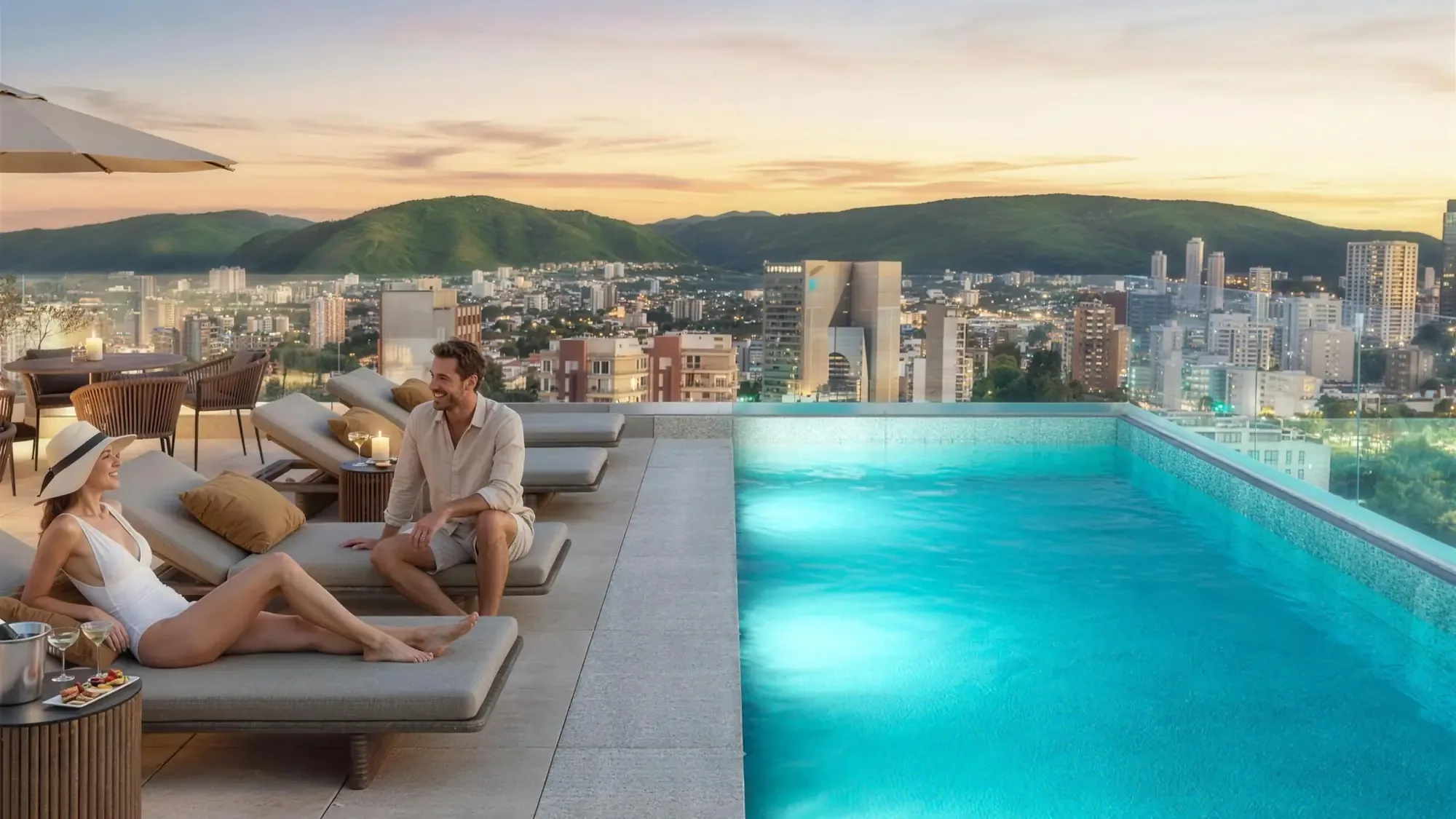 Terraza con alberca sobre la ciudad al atardecer